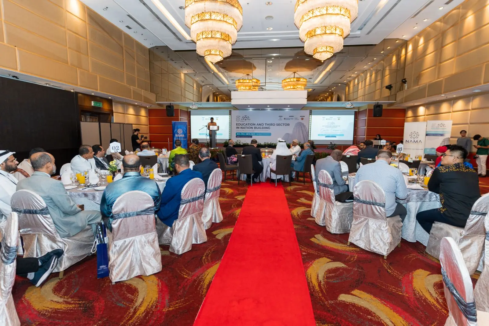 Guests at a NAMA Foundation dinner in a hotel ballroom
